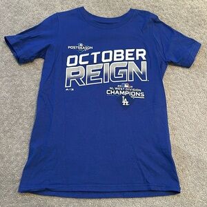 Two Los Angeles Dodgers postseason tshirts. Both size youth small.
